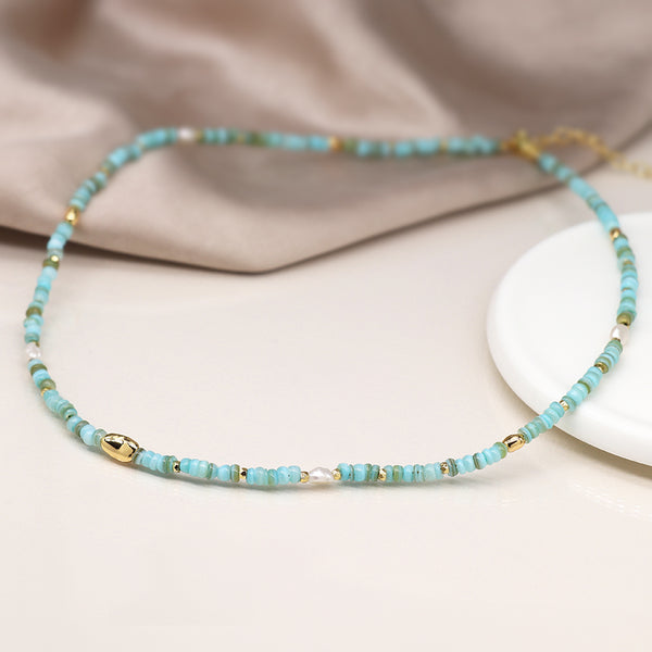 04308 Mixed aqua blue, pearl and faux gold bead necklace