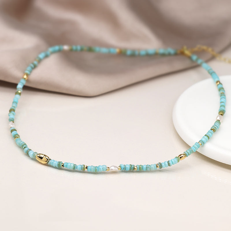 04308 Mixed aqua blue, pearl and faux gold bead necklace